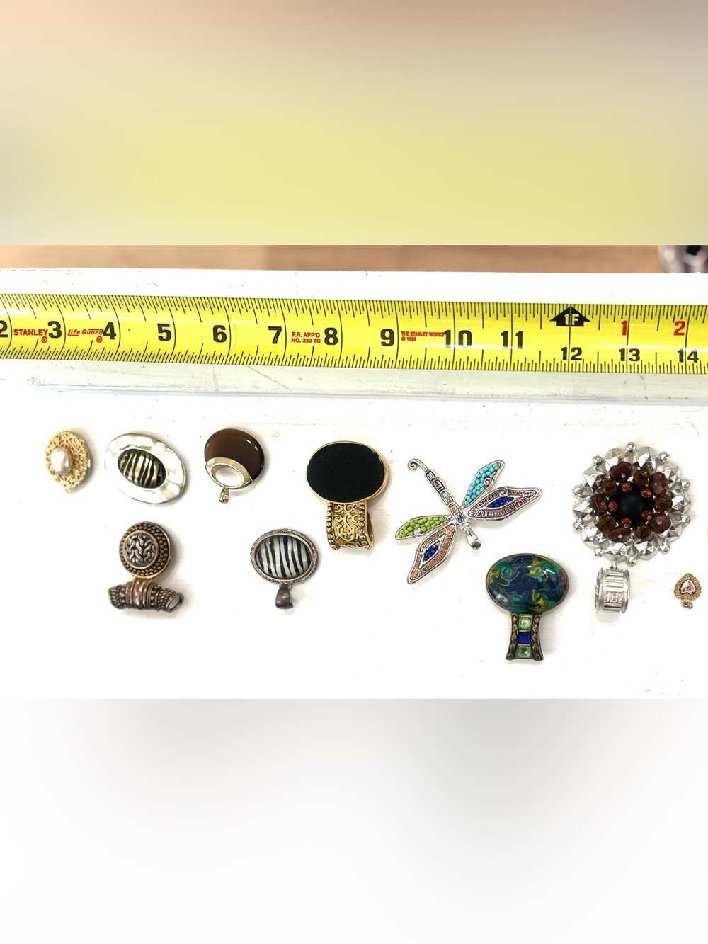 A Bundle of 10 Pendants w multiple finishes: gold, silver, tigers eye, Turquoise